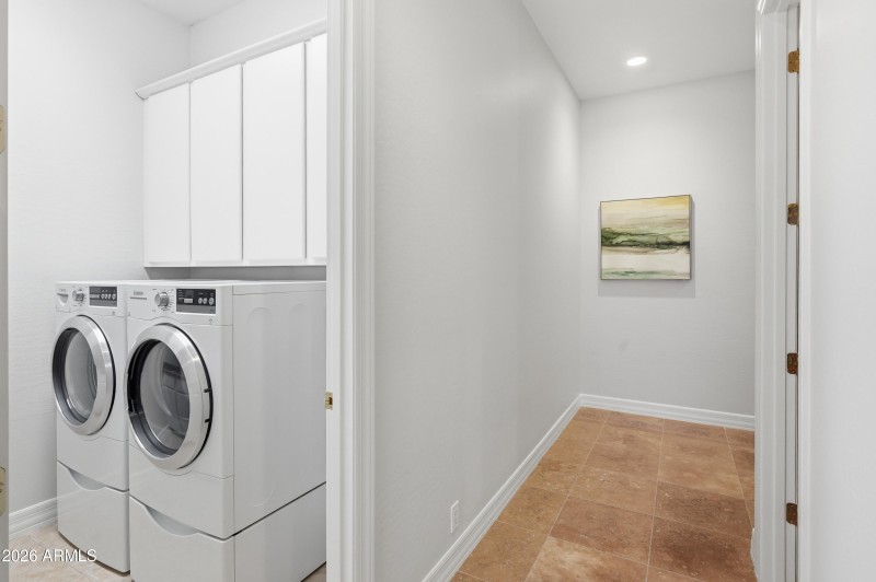 Laundry room with lots of cabinets