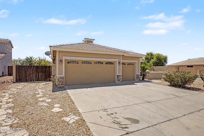 6668 S Garnet WAY- Front
