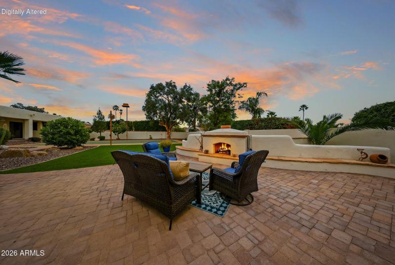Outside-fireplace-sitting-area-with-view