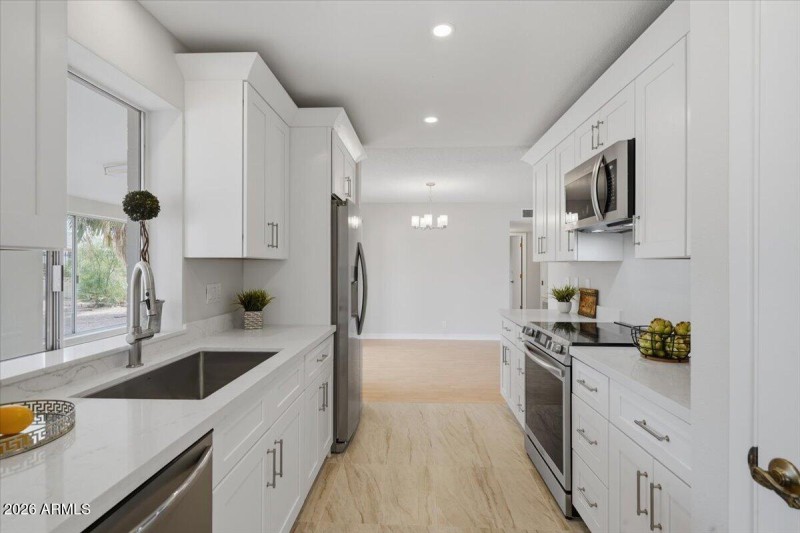 Kitchen leads to Laundry