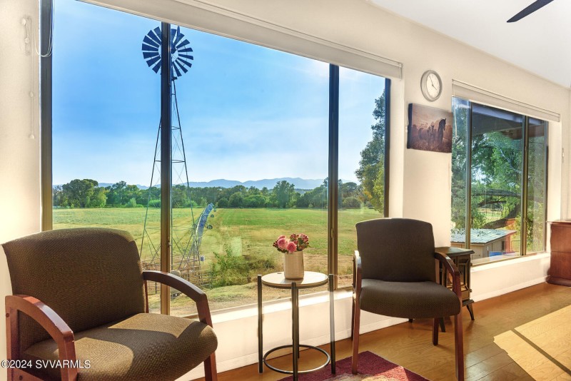 Views of pasture and tree lined creek